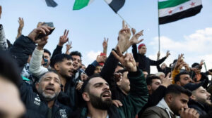 Mixed reactions to Assad’s ouster as Syrians celebrate, neighbors brace for uncertainty