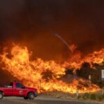 Blaze erupts near LA, forcing 19,000 to flee homes